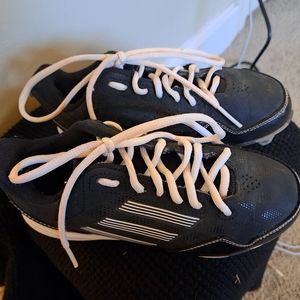 Like New !!! Size 1 Adidas cleat in Navy. Great condition .